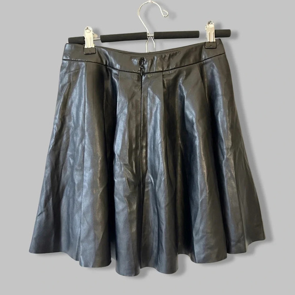 Bebe Black Faux Leather Pleated Mini Circular Skirt - Picture 2 of 10